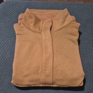 Nike Sportswear Swoosh Half-Zip Fleece Top in the "Flax/Cactus Flower" colorway.